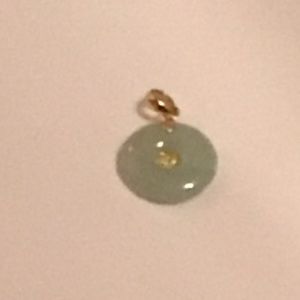 GOLD AND JADE PENDANT
